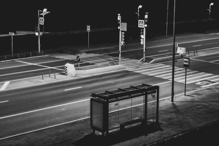 Isolated bus stop at night